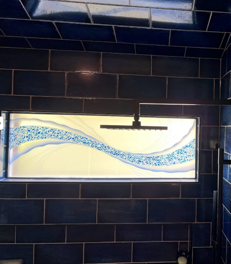 Compact bathroom window with artistic etched glass