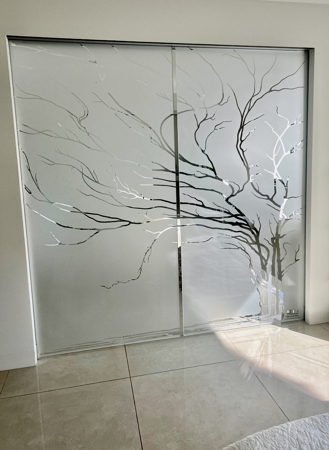 Shower Door showcasing a Frosted Glass Tree Design with Sandblast Etched Glass Art by Sans Soucie Wispy Tree Wild Design