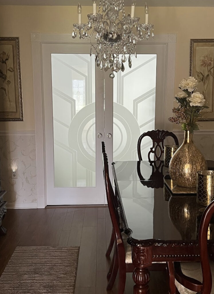 Pair interior doors with frosted glass geometric design allowing soft light flow between rooms