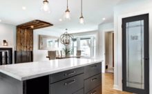 A modern kitchen with a frosted glass pantry door-Pantry door makeover ideas using frosted glass designs by Sans Soucie Art Glass