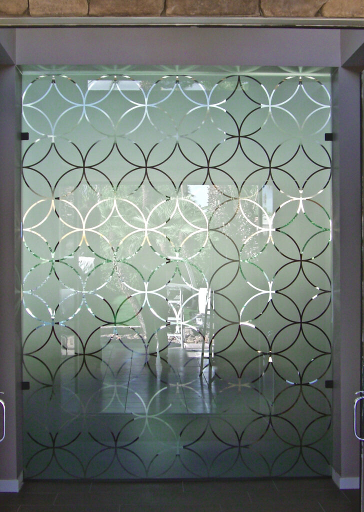 Custom glass partition wall with geometric pattern