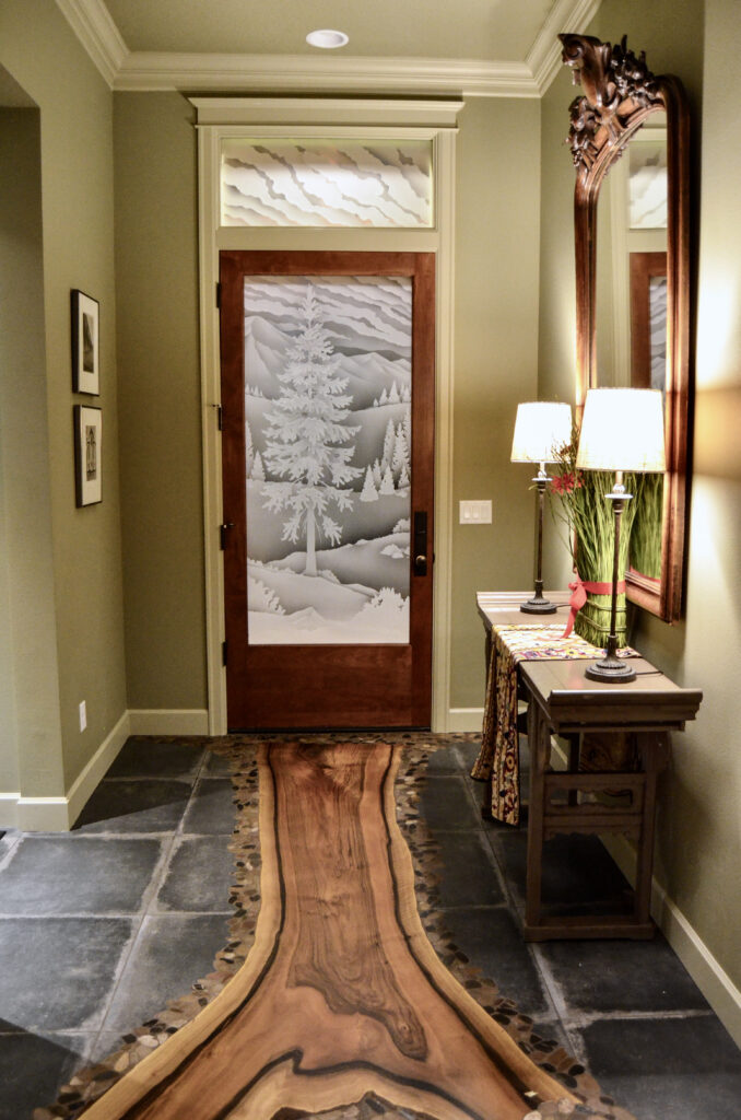 Glass door privacy with detailed desert mountain landscape and pine tree scene, nature-inspired decorative glass front door privacy