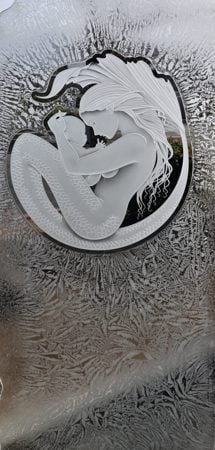 Shower Door featuring a Frosted Glass Oceanic Design Sandblast Etched Glass Mermaid and Child Design by Sans Soucie