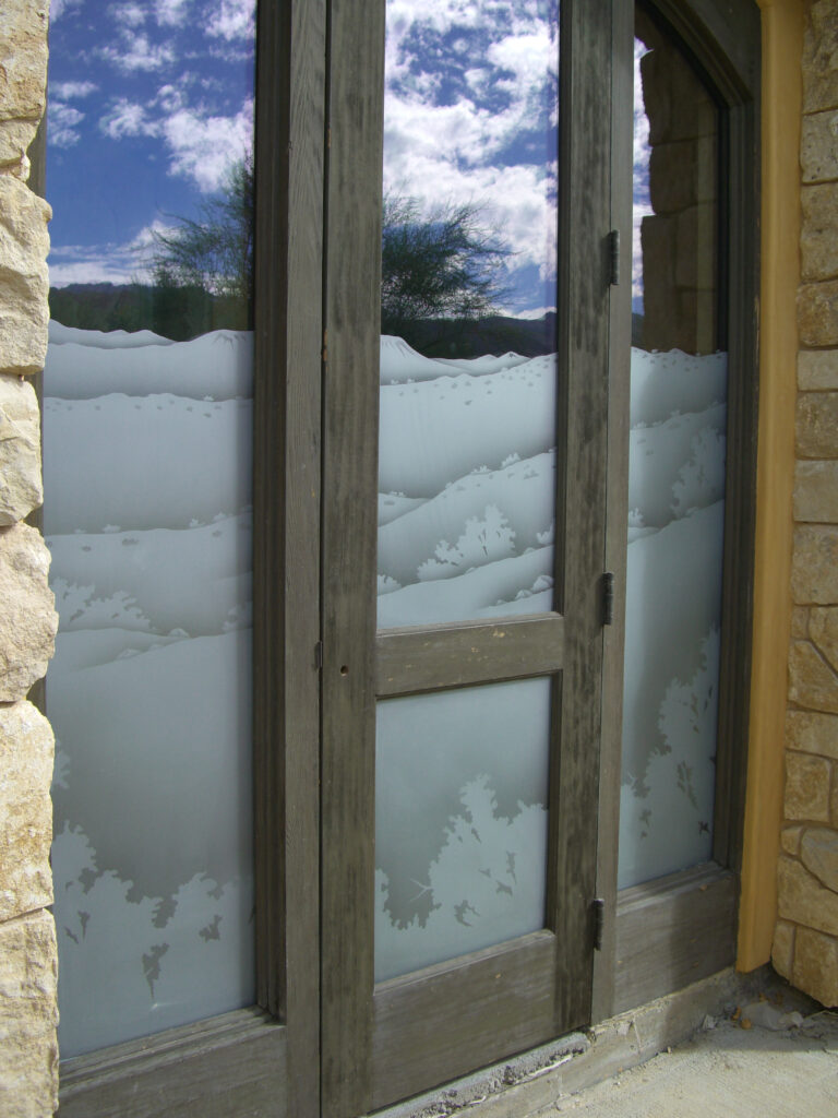 Front entry door and window combo with Desert Mountains frosted glass window design by Sans Soucie