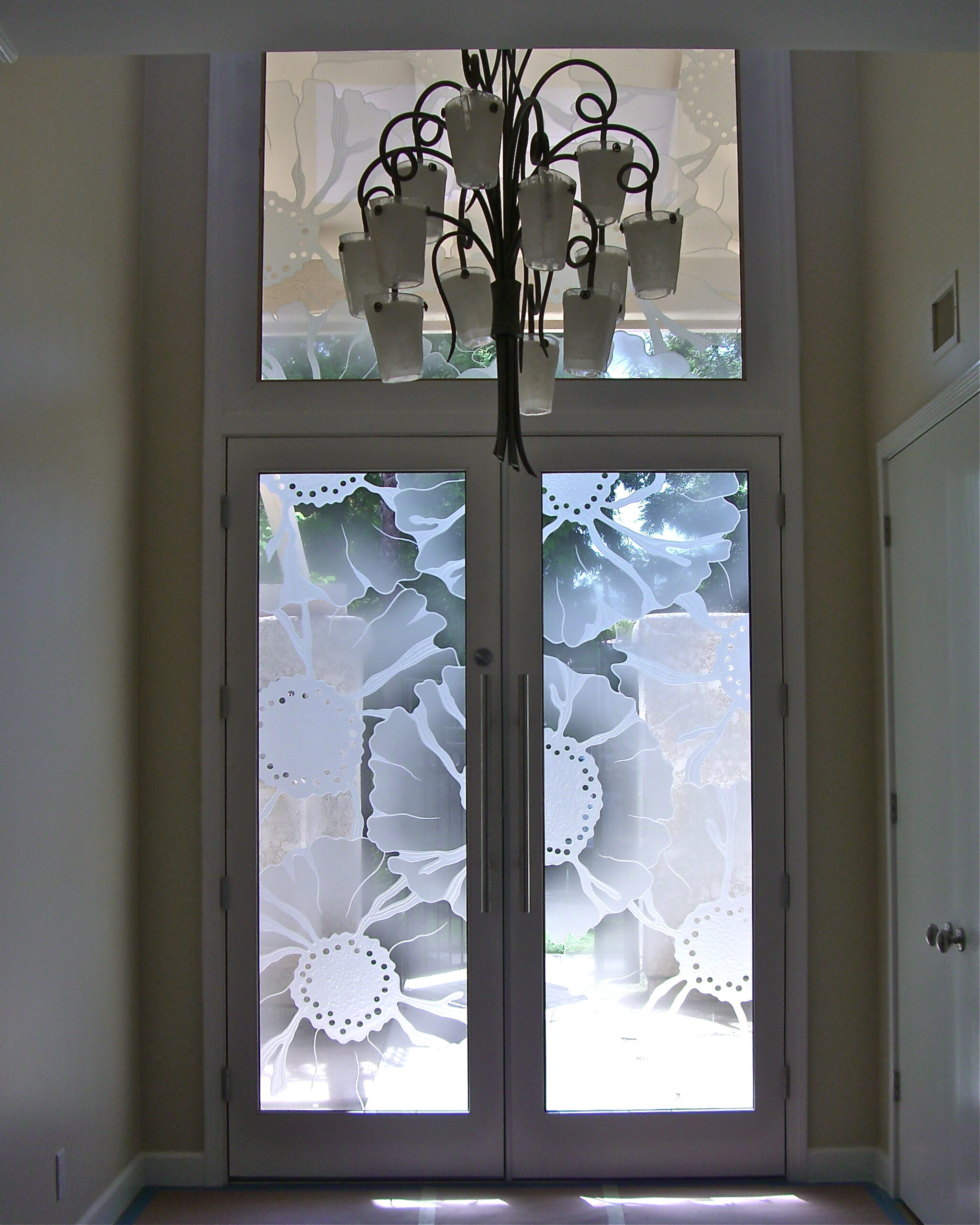 French doors with floral glass design for art deco homes