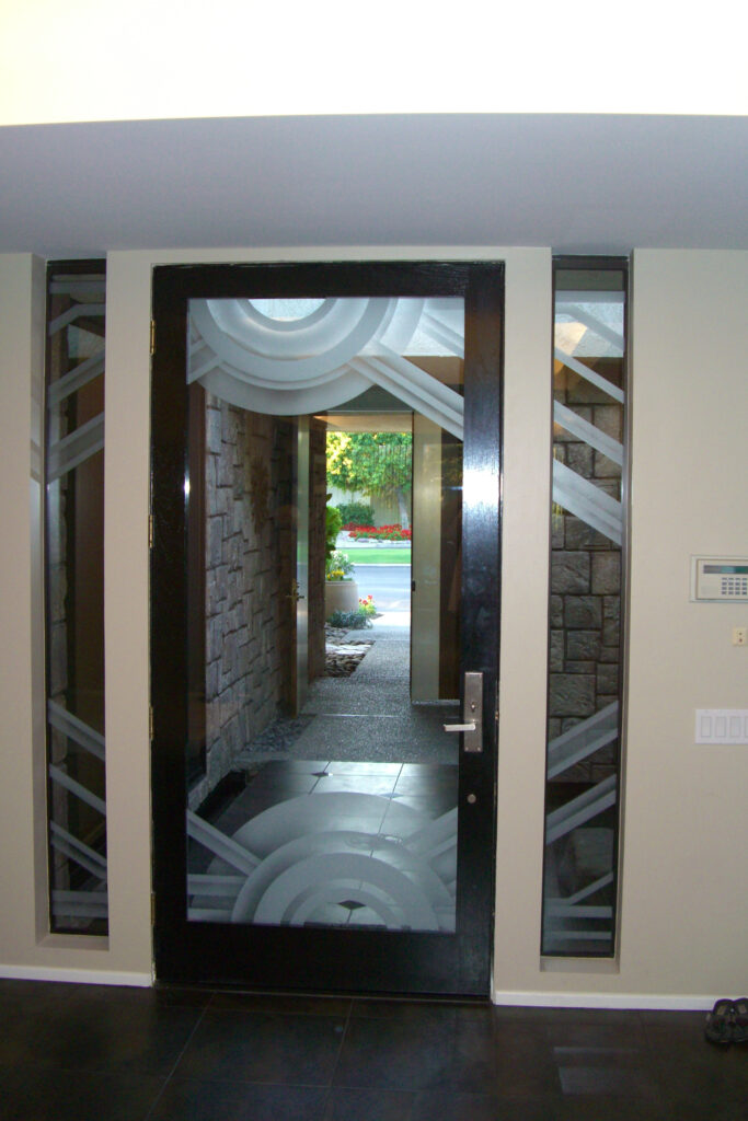 glass entry doors showing etched, frosted glass with matching sidelights