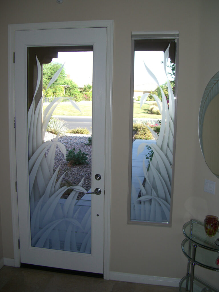 Laminated glass door and sidelights with etched designs