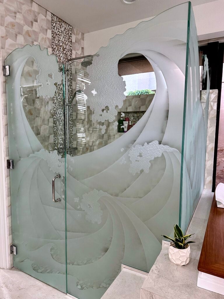 Carved glass bathroom shower glass and door.