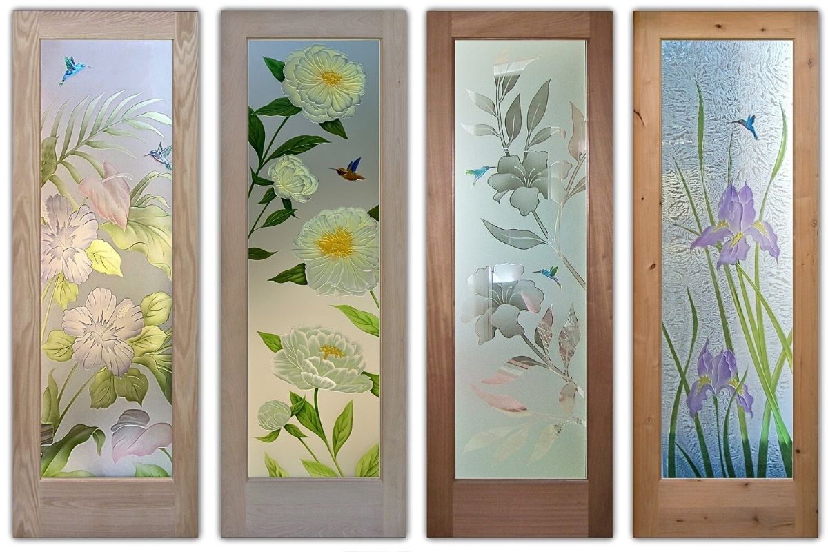 Four farmhouse pantry doors with frosted glass floral and hummingbird designs, each framed in a different natural wood finish to highlight the artistic etched glass panels.