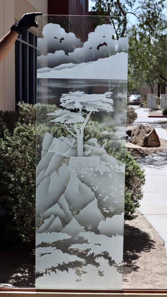 Clear glass panel featuring a sandblasted pattern Lone Cypress