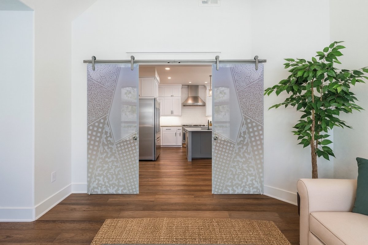 Handcrafted glass barn doors showcasing modern and artistic styles.