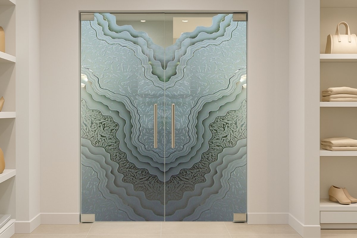 Frameless double glass doors separating a clean, upscale retail display area from a backroom space with shelving and inventory.