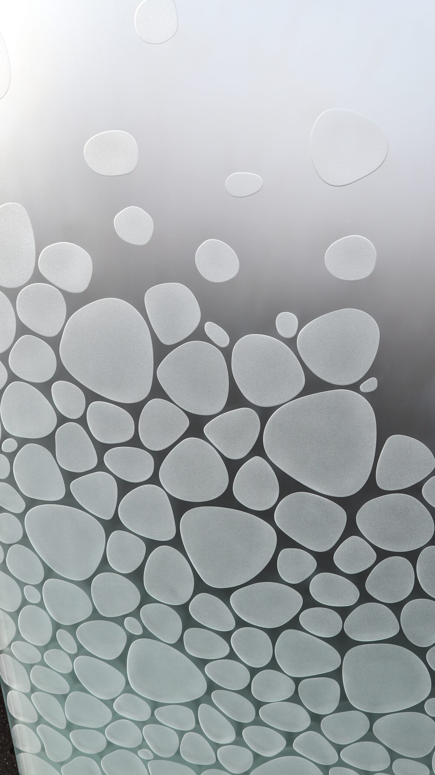 Detailed 3D frosted glass design of river rocks, with a smooth texture that brings an organic, natural touch to your space.