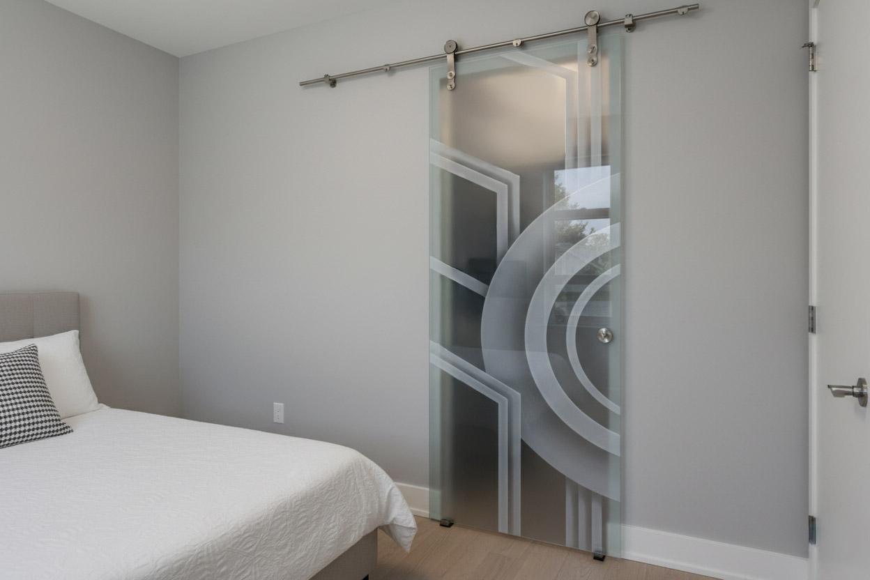 custom private glass barn door for modern homes by Sans Soucie Art Glass