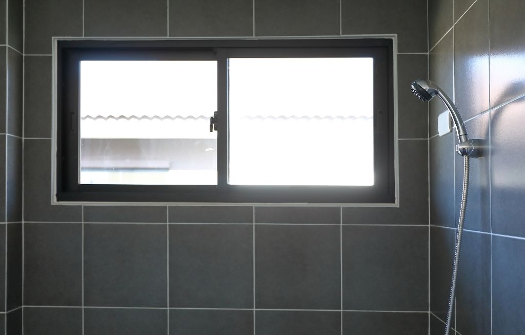 black-framed modern shower window