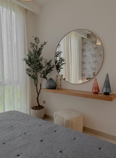 Modern minimalist bedroom decor with mirror