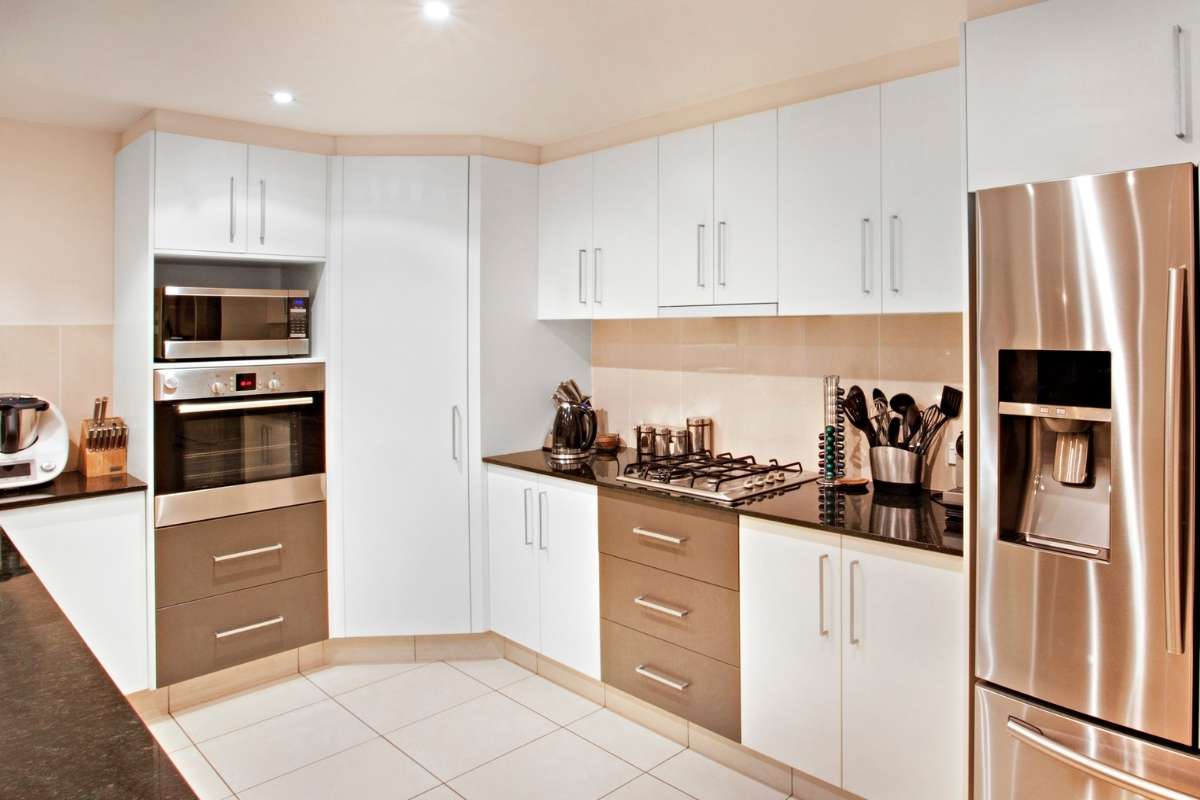 Pantry door seamlessly integrated into the kitchen cabinets