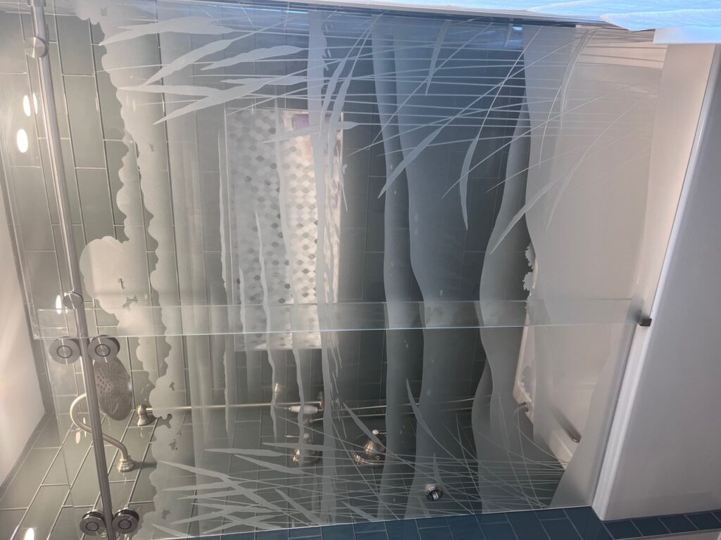 Freestanding or sliding carved glass panels