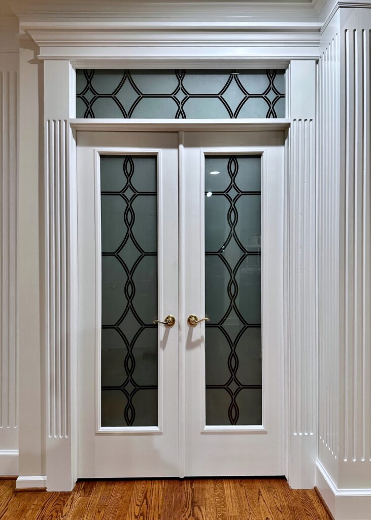 Frosted glass double interior doors with transom, Diamond Beads design in 1D negative, shown with interior lights off for a darker appearance