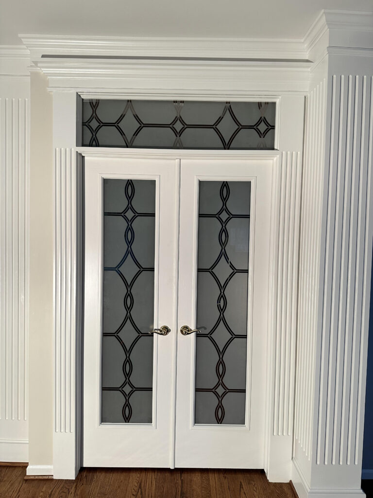 Diamond Beads frosted glass interior double doors with clear glass lines appearing black in low lighting conditions