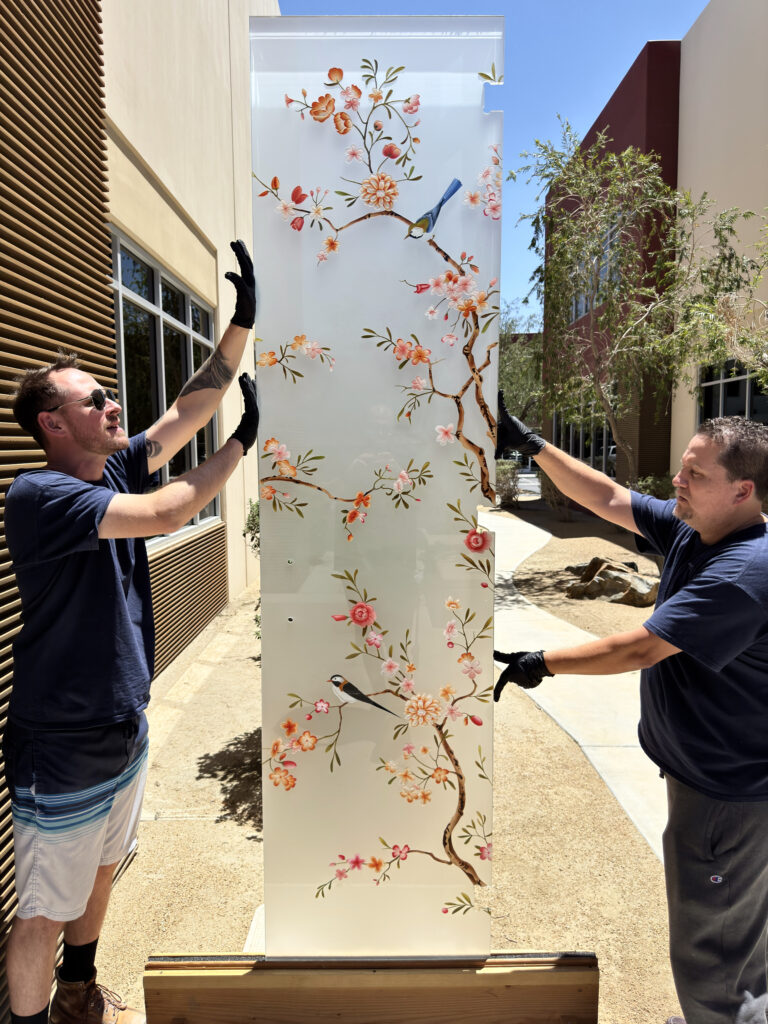 Custom decorative frosted glass panel with hand-painted cherry blossoms and songbirds, showcasing premium craftsmanship, lasting durability, and a one-of-a-kind architectural design
