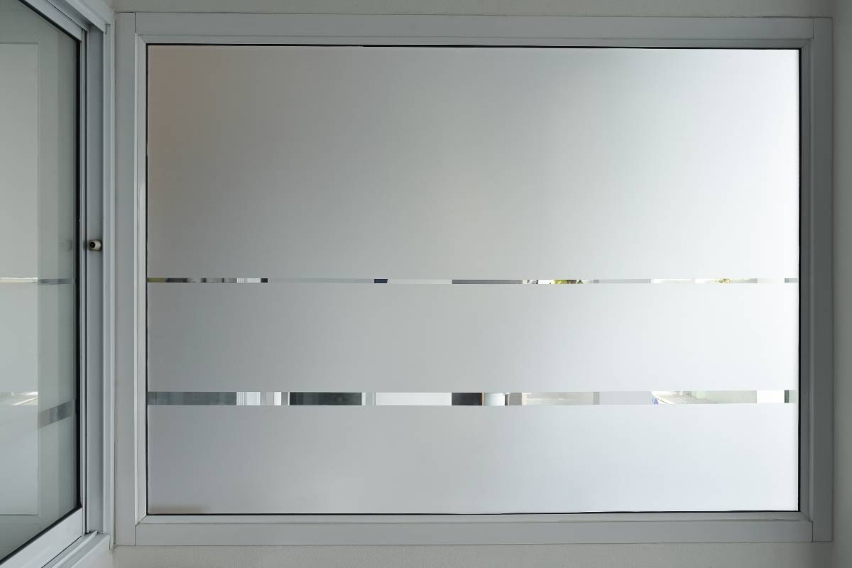 Aluminium sliding window of office. Decorative Glass Film, image credit BCH from BCH
